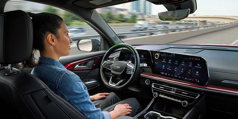 2024 Chevrolet Traverse interior view of woman driving