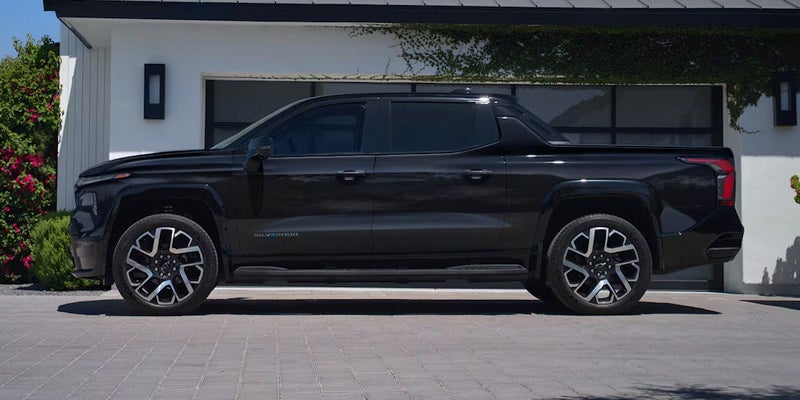 Black 2025 Silverado EV side view